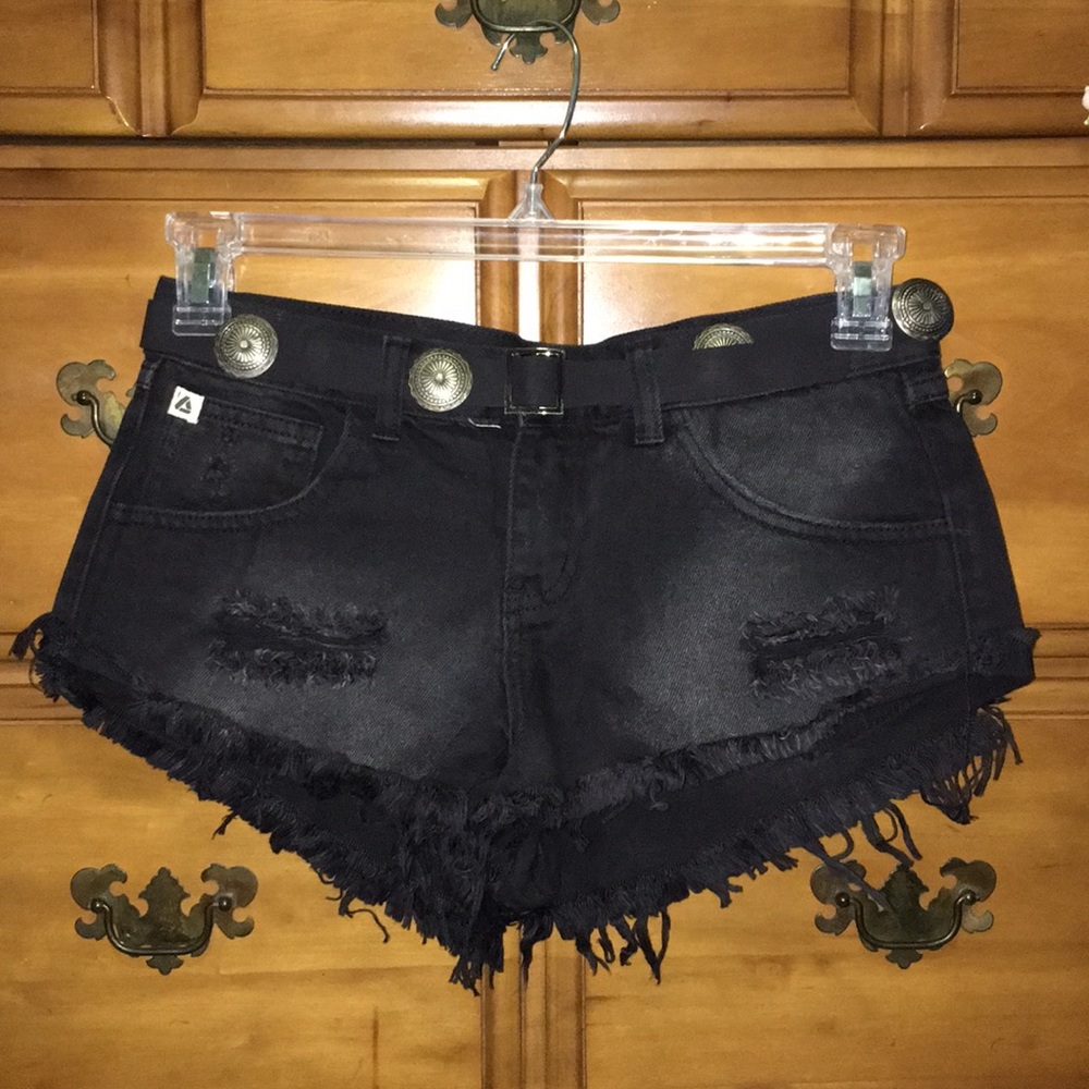 Distressed black denim shorts